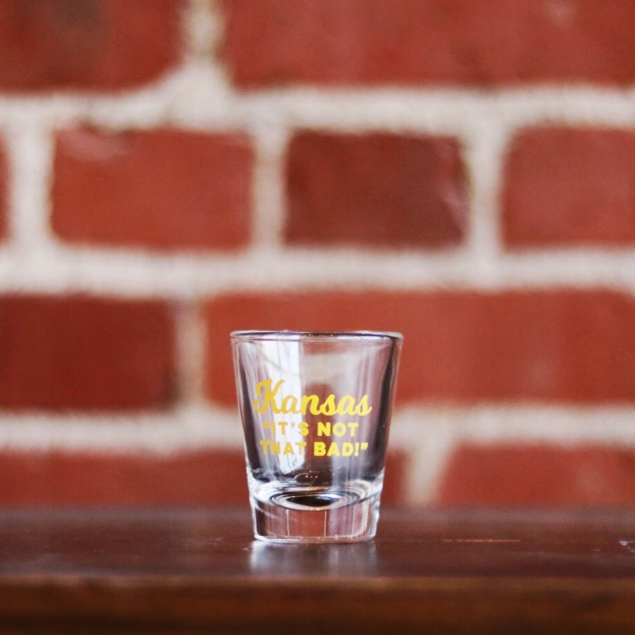 Load image into Gallery viewer, Kansas: &amp;quot;It&amp;#39;s Not That Bad!&amp;quot; Shot Glass
